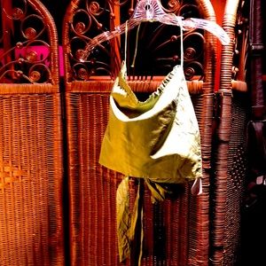 Harwood S halter top in green with bow back